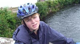 Olly describes how he feels after riding through all the rain this morning, at Santon Bridge, 25.8 miles from the hostel